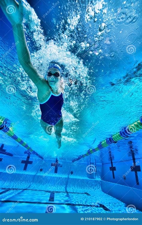 Underwater Shot Of Woman Swimming In Pool Stock Photo Image Of