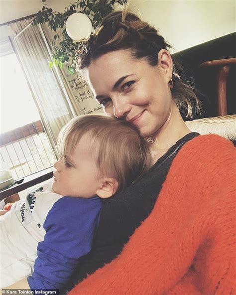 kara tointon looks every inch the doting mum as she shares a sweet snap cuddling son frey 16