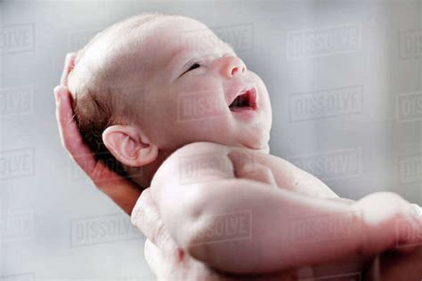 Close Up Of Laughing Baby Boy Stock Photo Dissolve