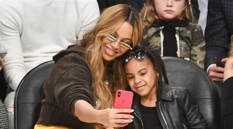 beyoncé shares heartwarming moment with daughter blue ivy at renaissance premiere screennearyou