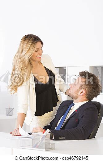 Businesswoman Flirting With Work Colleague Businesswoman Flirting With