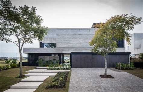 The Fsy House Overlooks A Lagoon Just Outside Of Buenos Aires Architecture House Concrete