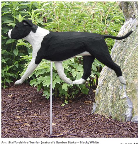 With its intricate and animated details, this compact statue is perfect for a multitude of settings, from your garden and porch to your living room or foyer. Pit Bull Statue: Dog Statues & Garden Statues (Black/White)