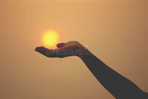 Sun On Female Hand Silhouette Of Hand Holding Sun Stock Image Image