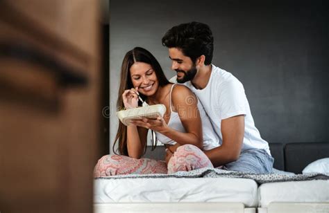 Romantic Happy Couple In Love Having Breakfast In Bed Stock Image