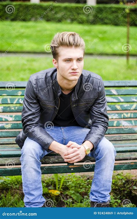 Handsome Blond Young Man Sitting On Park Bench Stock Image Image Of
