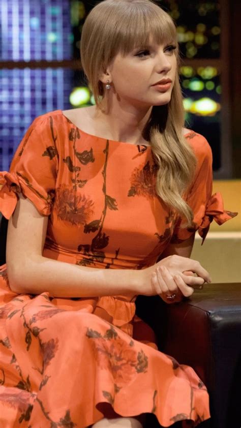 Taylor Swift Sit Orange Dress Popular Singer 720x1280 Wallpaper