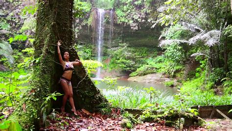 Sexy Girl Leaning Huge Tree In Rainforest Background Waterfall Stock