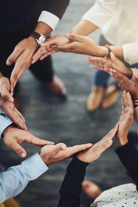 Teamwork Solidarity And Business People With Their Hands Together In A