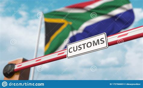 Barrier Gate With Customs Sign Being Closed With Flag Of South Africa