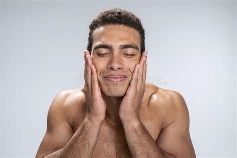 Man Enjoying His Soft Face After Shaving Stock Image Image Of Caring