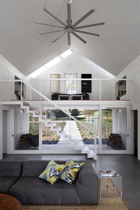 As rustic style looks for natural and simple lines and designs, it could seem difficult to find a ceiling fan, such a modern piece and necessary piece, within those stylistic requirements. Modern barn / ranch style house in the San Francisco Bay area