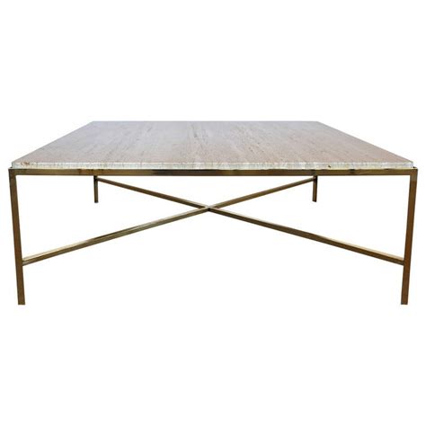 Consider a white marble coffee table with brass legs. Solid Brass and Marble "X" Base Square Coffee Table at 1stdibs