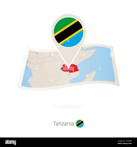 Folded Paper Map Of Tanzania With Flag Pin Of Tanzania Vector