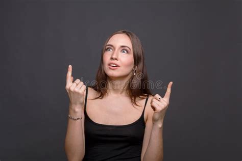 Shocked Girl Looking And Pointing Up Stock Photo Image Of Expression