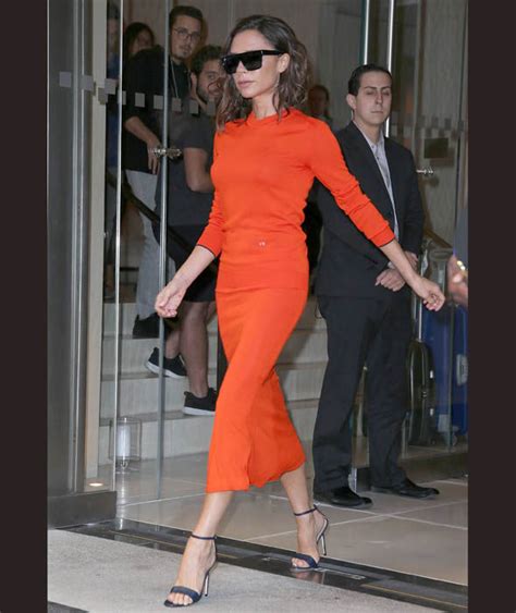 Victoria Beckham Was Spotted In A Vibrant Orange Dress Victoria Beckham In New York