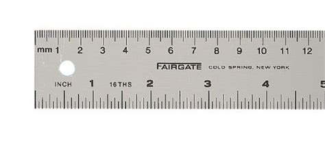 On a typical ruler containing both mm and inches scales, where the scales are reversed with respect to each other, 94 mm is opposite 8 5/16 inches. Aluminum English/Metric Ruler | Artist Supply Source