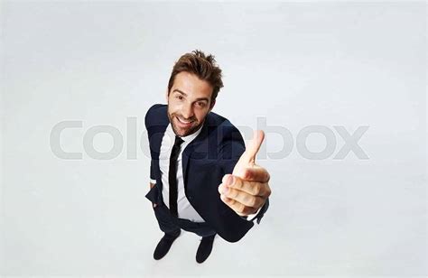 Smiling Businessman With Hand To Stock Photo Colourbox