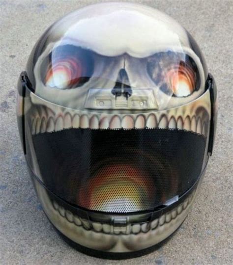 In the following collection we've gathered some weird and cool examples demon skull helmet from devil tail designs. PhotoPasal: 20 Cool and Creative Motorcycle Helmet Designs.