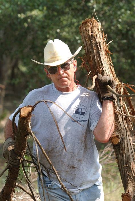 President George W Bush Clears Cedar At His Ranch In Crawford Texas
