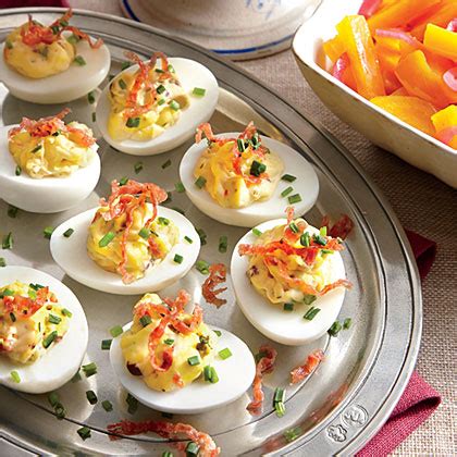 This is the appetizer we're bringing to every party this holiday season. Muffuletta Deviled Eggs Recipe | MyRecipes