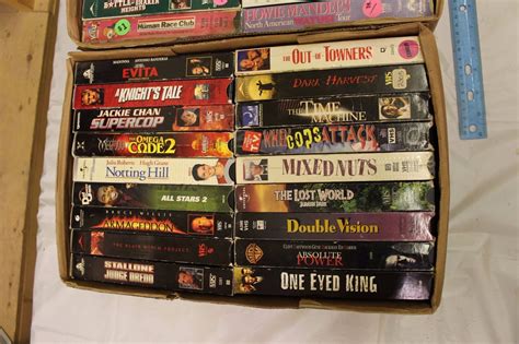 3 Boxes Of Vhs Movies