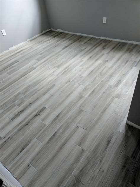 Available in four rich colors, this versatile tile makes every outdoor space a breath of fresh air. Daltile Saddle Brook Gravel Road | Wood look tile floor ...
