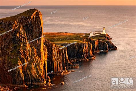 View Of Sea Cliffs And Lighthouse At Sunset Neist Point Lighthouse