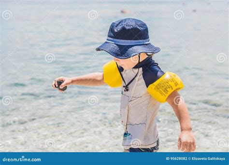 The Boy Enjoys The Tropical Sea And The Beach Stock Photo Image Of