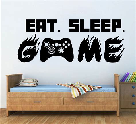 A Wall Decal With The Words Eat Sleep Game On It In Black And White