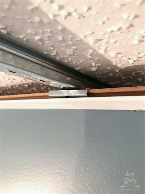 Especially since the you may remember that i talked and talked and talked about wanting a planked ceiling in both the kitchen and. How to Cover a Popcorn Ceiling Using Beautiful Armstrong ...