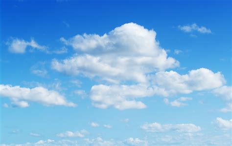 Fluffy Cloud Texture From A Perfect Cloudy Blue Sky