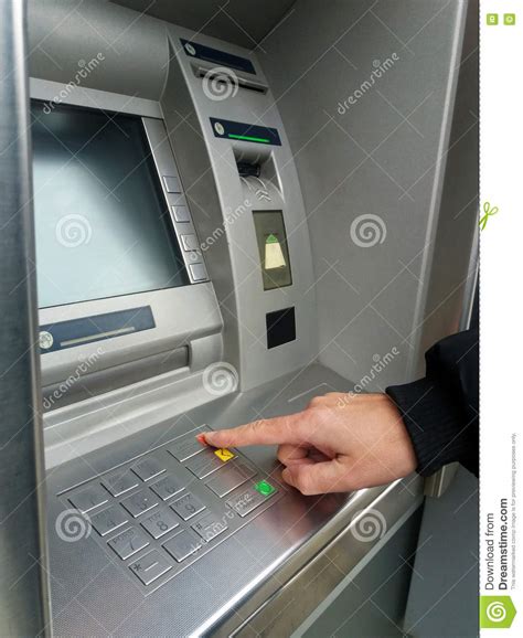 Find atms near your location and anywhere in the world. Man`s Using The ATM Machine With Cash Cards. Close-up Of ...