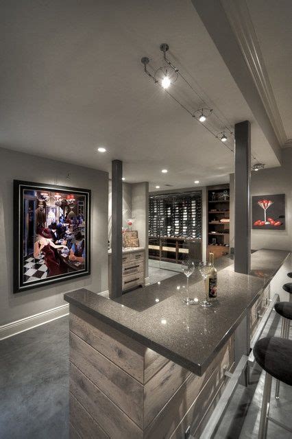 This expansive finished basement features lightly colored carpeting and recessed lighting throughout. Wine Cellar - Bar - modern - wine cellar - ... | Home bar ...