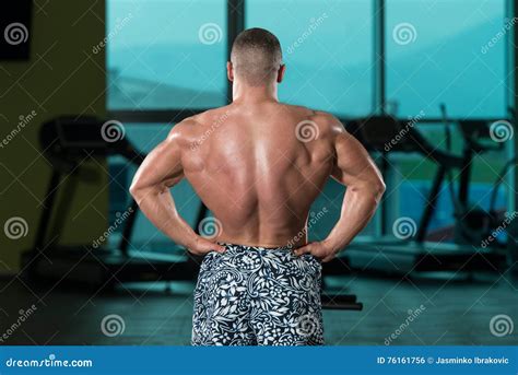 Muscular Man Flexing Muscles In Gym Stock Photo Image Of Model Diet
