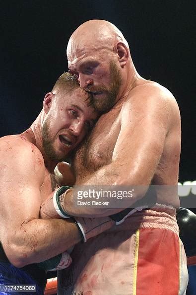 Tyson Fury And Otto Wallin Embrace During Their Heavyweight Bout At