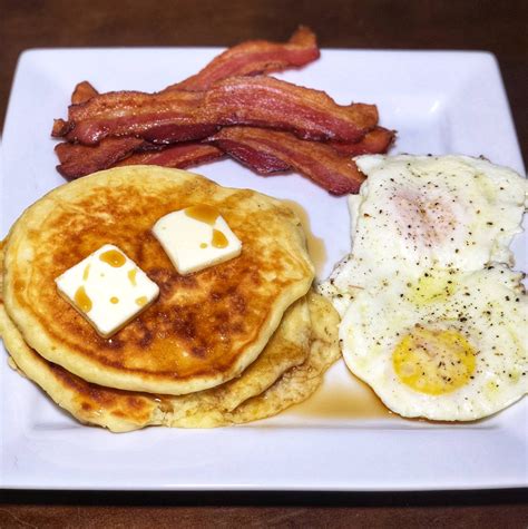Homemade Buttermilk Pancakes Over Medium Eggs And Bacon Food