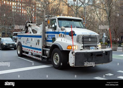 A Nypd New York Police Department Tow Truck On The Street In New York