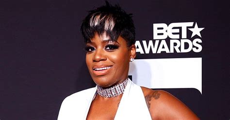 Check Out Fantasia Barrino In Front Of A Lavish Car With Her Curves Poured Into A Tight Dress