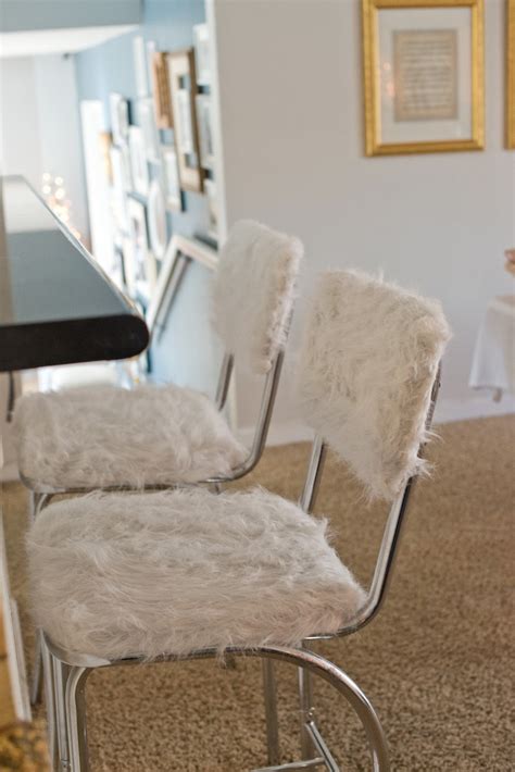 Flip your stool over, and secure the excess faux fur to the base of the stool use a staple gun. Domestic Fashionista: Faux Fur Covered Bar Stools