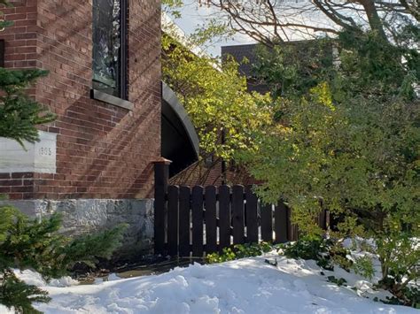 Clear polycarbonate covers over the stairs and platforms provide. Basement entrance stair canopy for a church | Kreider's ...