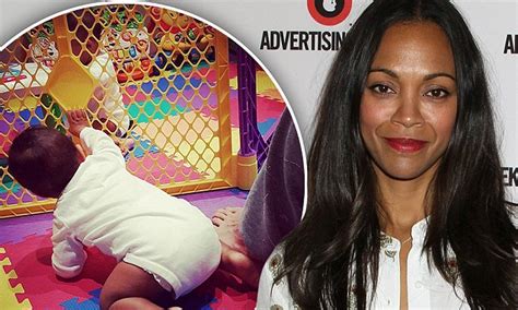 zoe saldana shares photo of her twin sons wide awake in their play pen daily mail online