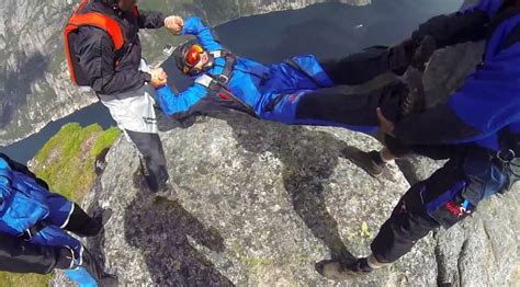 Watch Base Jumper Gets Thrown Off Top Of Norwegian Cliff By Friends