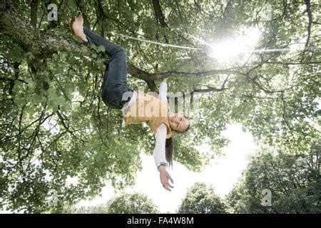 Nude Girl Climbing A Tree Stock Photo Alamy