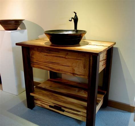 Appealing Modern Unique Vessel Sink With Black Color Pottery Vessel
