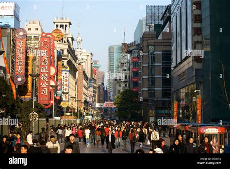 A Busy Shopping Street In Shanghai China Stock Photo Alamy