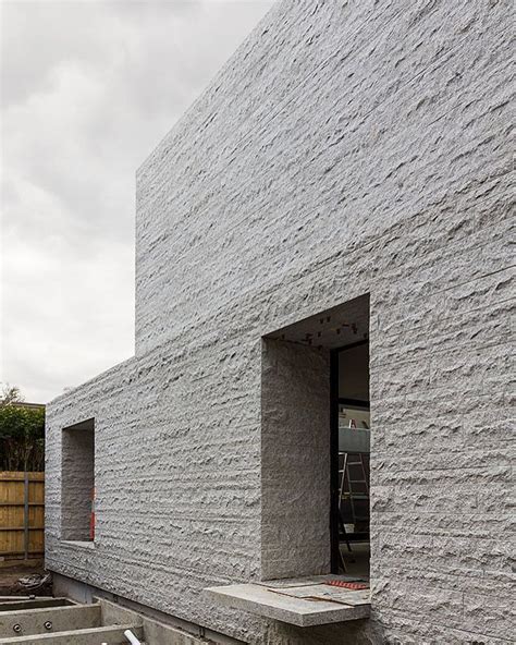 Rear Facade In Rough Granite At The Armadale Residence By Be
