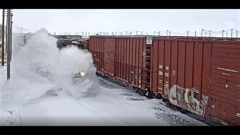 Train Plows Through Snow Drift Youtube