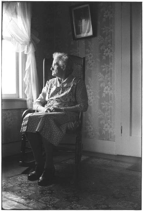 Grandmother In Rocking Chair Looking Out Window Grandmother