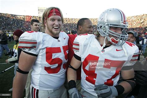 Nick Mangold And Aj Hawk Of Ohio State Celebrate After Defeating
